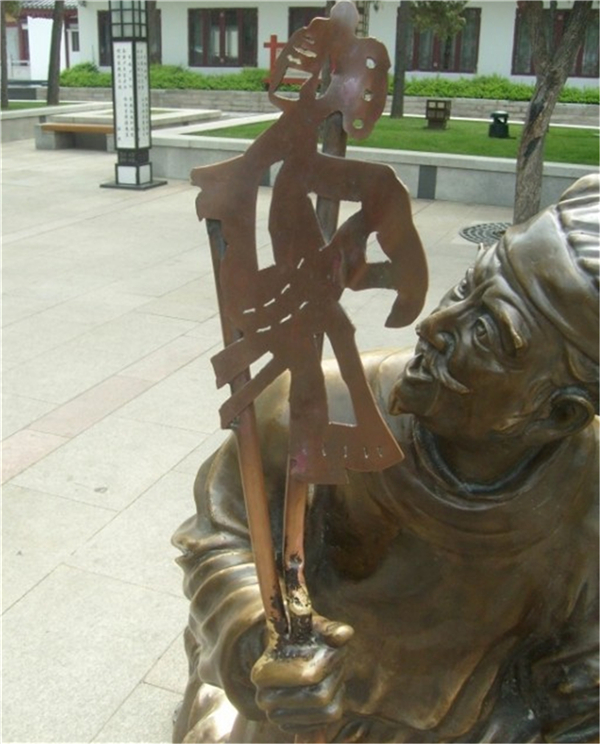 鑄銅皮影戲雕塑.jpg